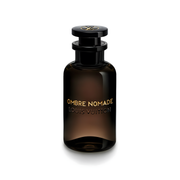 Louis Vuitton Ombre Nomade perfume bottle with luxurious oud fragrance, premium branding and elegant design showcased.